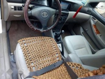 Toyota Corolla altis MT 2002 - Cần bán lại xe Toyota Corolla altis MT đời 2002, màu trắng, 185 triệu