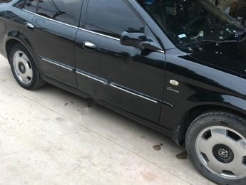 Daewoo Magnus 2.5 AT 2004 - Cần bán lại xe Daewoo Magnus 2.5 AT đời 2004, màu đen, nhập khẩu nguyên chiếc, giá tốt