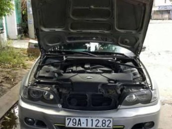 BMW 3 Series  318i 2004 - Cần bán lại xe BMW 3 Series 318i đời 2004, màu bạc