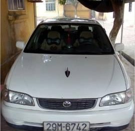 Toyota Corolla     2001 - Bán Toyota Corolla đời 2001, màu trắng, xe nhập số sàn