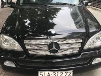 Mercedes-Benz ML Class ML 320 2003 - Cần bán xe Mercedes ML 320 đời 2003, màu đen, giá chỉ 315 triệu