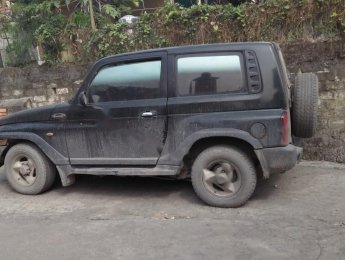 Ssangyong Korando TX-5 4x4 MT 1999 - Bán xe Ssangyong Korando TX-5 4x4 MT đời 1999, màu đen