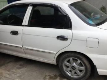 Kia Spectra 2004 - Chính chủ bán Kia Spectra đời 2004, màu trắng