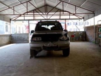 Suzuki Vitara JLX 2004 - Cần bán gấp Suzuki Vitara JLX sản xuất năm 2004, màu xanh lam chính chủ