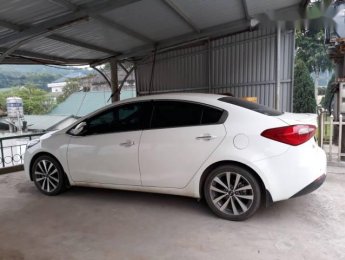 Kia K3 1.6AT  2014 - Bán Kia K3 1.6AT năm sản xuất 2014, màu trắng số tự động, 535 triệu