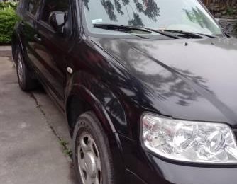 Ford Escape 2005 - Bán ô tô Ford Escape năm 2005, màu đen