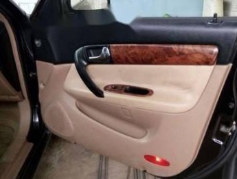 Daewoo Magnus 2005 - Bán xe Daewoo Magnus sản xuất 2005, màu đen, giá chỉ 170 triệu