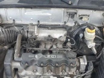 Daewoo Lanos SX 2003 - Cần bán Daewoo Lanos SX sản xuất 2003, màu bạc, giá chỉ 84 triệu