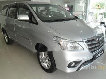 Toyota Innova 2014 - Cần bán lại xe Toyota Innova năm sản xuất 2014, màu bạc số sàn, 590tr