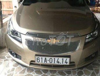 Chevrolet Cruze 2011 - Bán Chevrolet Cruze sản xuất năm 2011, màu vàng cát