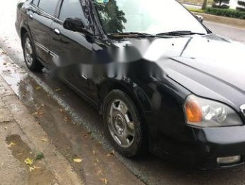 Daewoo Magnus    2004 - Cần bán gấp Daewoo Magnus đời 2004, màu đen, giá chỉ 145 triệu
