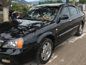 Daewoo Magnus 2.5 AT 2004 - Cần bán xe Daewoo Magnus 2.5 AT đời 2004, màu đen