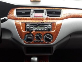 Mitsubishi Lancer GLX 2003 - Chính chủ bán Mitsubishi Lancer GLX sản xuất năm 2003, màu bạc