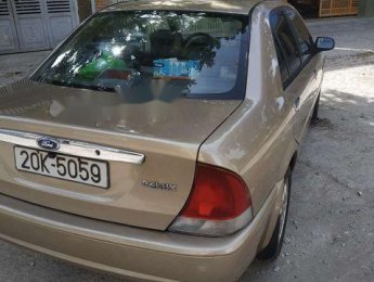 Ford Laser    2001 - Cần bán xe Ford Laser 2001, màu vàng