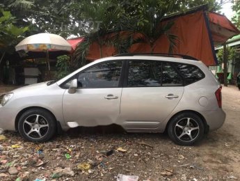 Kia Carens    2010 - Bán xe Kia Carens đời 2010, màu bạc, 7 chỗ, ít hao xăng 7L/100km