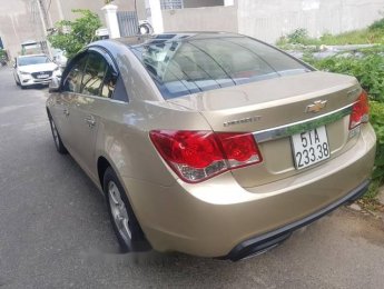 Chevrolet Cruze 2011 - Bán Chevrolet Cruze sản xuất năm 2011, màu vàng cát