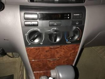 Toyota Corolla LE  2005 - Cần bán Toyota Corolla LE 2005, màu trắng, nhập khẩu nguyên chiếc số tự động