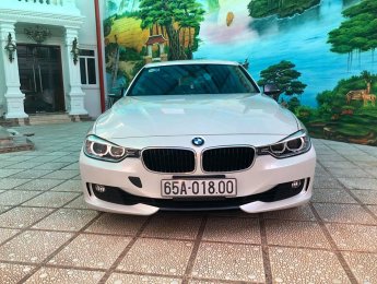 BMW 3 Series 320i 2012 - Bán xe BMW 320i màu trắng camay 2013 - 839 triệu