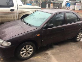 Mazda 323 2000 - Bán xe Mazda 323 đời 2000, xe nhập khẩu, màu nâu tím, máy còn nguyên bản