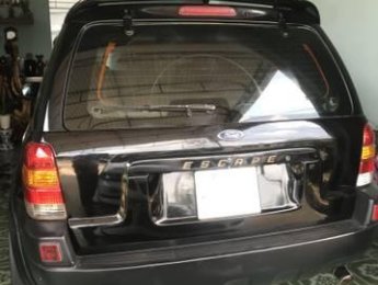 Ford Escape  MT 2003 - Bán xe Ford Escape MT đời 2003, màu đen, số sàn, giá chỉ 220 triệu