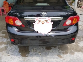 Toyota Corolla altis 2009 - Bán Toyota Corolla altis sản xuất năm 2009, màu đen số sàn, giá chỉ 385 triệu