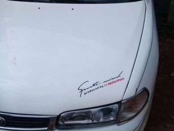 Mazda 626   1993 - Cần bán Mazda 626 1993, màu trắng, giá 100tr