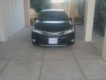 Toyota Corolla altis G 2015 - Bán ô tô Toyota Corolla altis G sản xuất năm 2015, màu đen