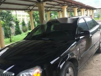Daewoo Magnus 2004 - Bán ô tô Daewoo Magnus đời 2004, màu đen 