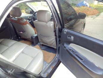 Mazda 323 2000 - Bán xe Mazda 323 đời 2000, xe đi làm hàng ngày, máy êm, số ngọt