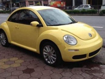 Volkswagen Beetle  2.0AT 2009 - Cần bán Volkswagen Beetle 2009, màu vàng, nhập khẩu, giá chỉ 618 triệu