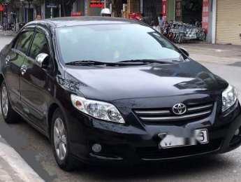 Toyota Corolla altis MT 2009 - Cần bán gấp Toyota Corolla altis MT sản xuất năm 2009, màu đen giá cạnh tranh