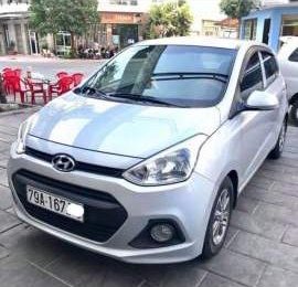 Hyundai Grand i10 2014 - Gia đình bán Hyundai Grand i10 sản xuất 2014, màu bạc, nhập khẩu  