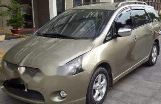 Mitsubishi Grandis 2015 - Bán Mitsubishi Grandis 2015, màu vàng, giá tốt