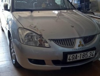 Mitsubishi Lancer 2004 - Cần bán xe cũ Mitsubishi Lancer năm sản xuất 2004, màu bạc xe gia đình