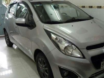 Chevrolet Spark   LT 2014 - Cần bán gấp Chevrolet Spark LT năm 2014, màu bạc, giá tốt