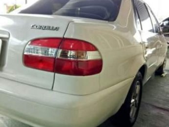 Toyota Corolla   2001 - Bán Toyota Corolla sản xuất năm 2001, màu trắng, 132 triệu