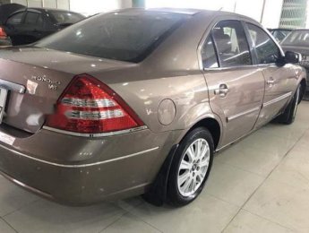 Ford Mondeo   2004 - Bán Ford Mondeo năm sản xuất 2004, màu vàng còn mới, 155 triệu