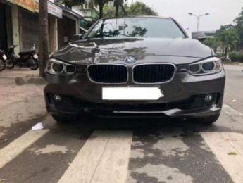 BMW 3 Series 2013 - Cần bán gấp BMW 3 Series 2013, màu nâu, 930tr