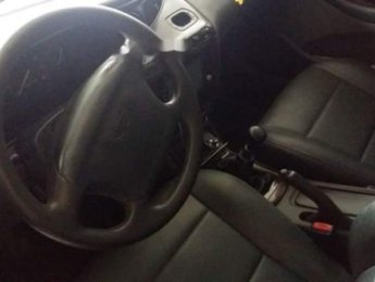 Daewoo Leganza 2002 - Gia đình bán lại xe Daewoo Leganza đời 2002, màu đen