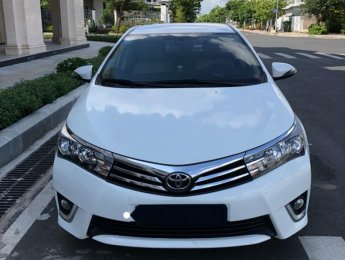 Toyota Corolla altis 1.8 G 2015 - Bán xe Toyota Corolla altis 1.8 G đời 2015, màu trắng số tự động