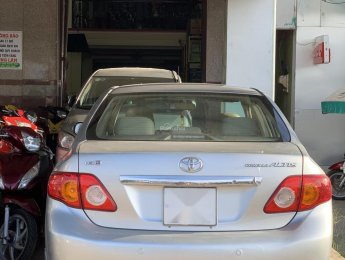 Toyota Corolla altis G 2010 - Cần bán Toyota Corolla altis G đời 2010, màu bạc
