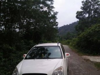 Kia Carens MT 2011 - Bán Kia Carens MT sản xuất 2011, màu trắng, giá 250tr