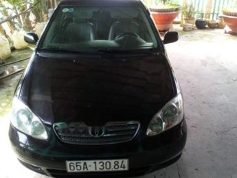 Toyota Corolla altis  MT 2003 - Cần bán lại xe Toyota Corolla Altis MT đời 2003, màu đen, xe nhà chạy rất kỹ