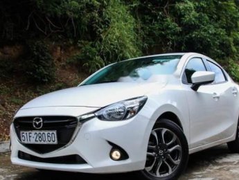 Mazda 2    2017 - Cần bán gấp Mazda 2 đời 2017, màu trắng, bảo trì hãng đúng định kì