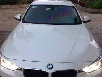 BMW 3 Series  320i  2012 - Cần bán lại xe BMW 320i sản xuất năm 2012, màu trắng, nhập khẩu nguyên chiếc