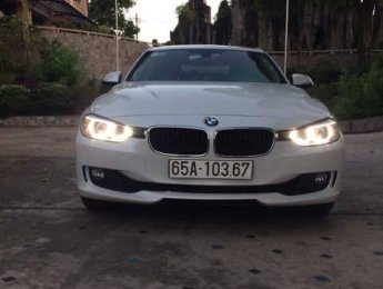 BMW 3 Series  320i  2012 - Cần bán lại xe BMW 320i sản xuất năm 2012, màu trắng, nhập khẩu nguyên chiếc