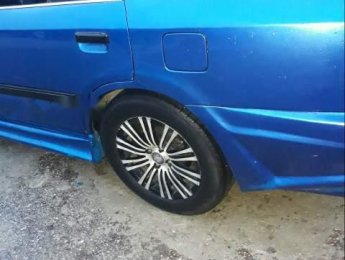 Mazda 323 1995 - Cần bán Mazda 323 năm sản xuất 1995, màu xanh lam