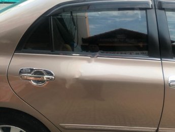 Toyota Corolla altis 2009 - Cần bán lại xe Toyota Corolla altis năm 2009, màu vàng xe gia đình