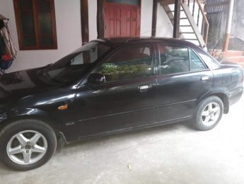 Mazda 323 2002 - Bán ô tô Mazda 323 đời 2002, màu đen
