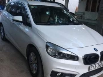 BMW 2 Series 218i 2015 - Bán xe BMW 2 Series 218i năm 2015, màu trắng còn mới, giá 900tr